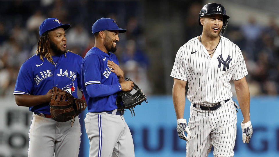 There likely won't be many smiles shared between the Blue Jays and Yankees this week. (Photo by Jim McIsaac/Getty Images)