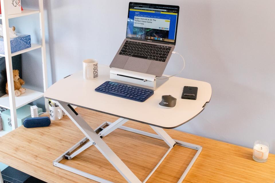 Standing desk converters