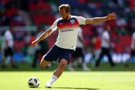 <p>England’s Harry Kane warms up ahead of the friendly international against Nigeria </p>