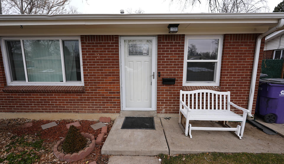 FILE - The residence where a former funeral home owner kept a deceased women's body in a hearse for two years as well as the remains of 30 cremated people is shown Friday, Feb. 16, 2024, in southwest Denver. Miles Harford, a former funeral home owner accused of hiding a woman's corpse in the back of a hearse for two years and hoarding the cremated remains of at least 30 people, was arrested Thursday night, Feb. 22, 2024, authorities said. (AP Photo/David Zalubowski, File(