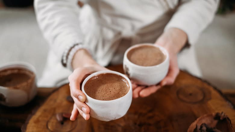 Two cups of cacao served