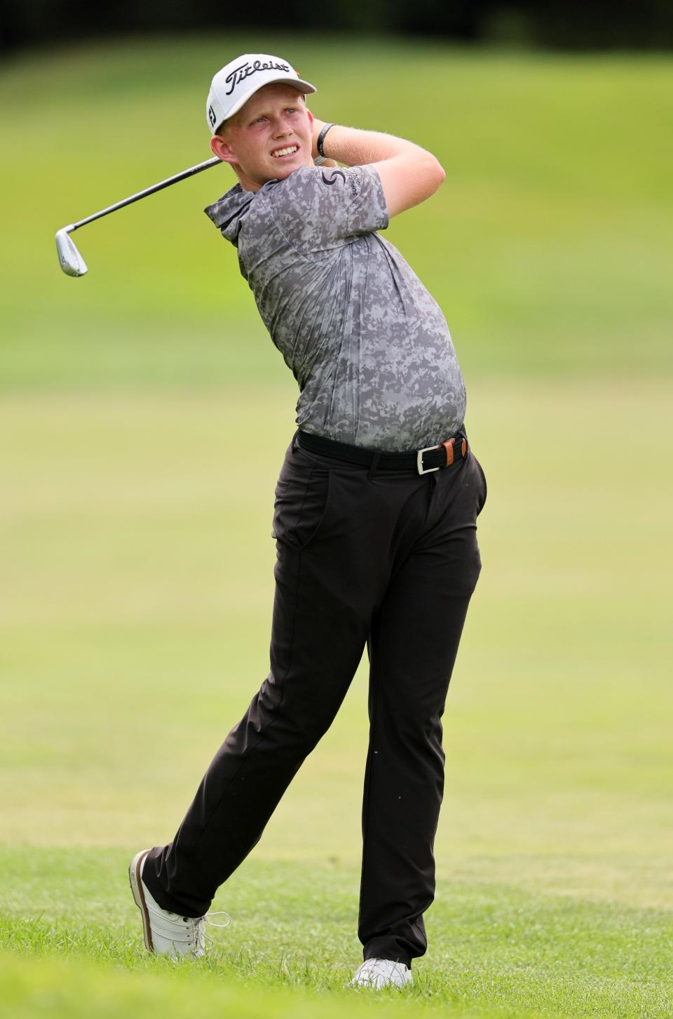 Former Green and current Ohio State golfer Maxwell Moldovan plays a second shot on the 11th hole Thursday during the first round of the PGA Barbasol Championship.