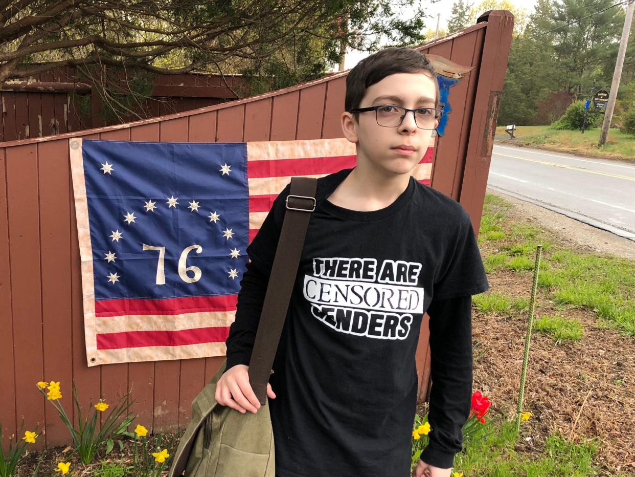 Liam Morrison, 12, on Friday, May 5 wearing a "censored version" of the T-shirt he wore to school the day he was sent home.
