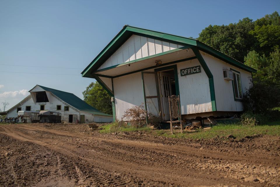 An office building at the McCormick family farm was lifted off of its foundation as flood water encroached on the more than 1,000-acre property near Nunnelly, Tenn, photographed on Tuesday, Aug. 24, 2021.