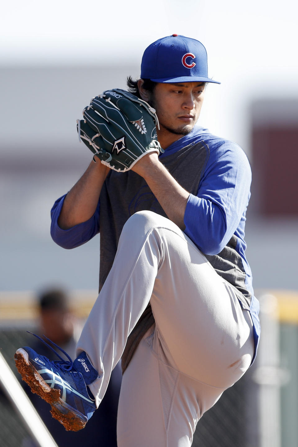 Chicago Cubs pitcher Yu Darvish throws during a spring training baseball workout Wednesday, Feb. 12, 2020, in Mesa, Ariz. (AP Photo/Gregory Bull)