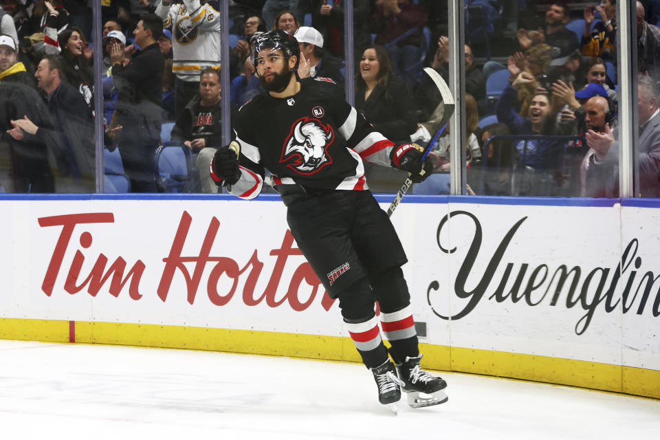 Buffalo Sabres left wing Jordan Greenway (12) celebrates his goal against the Los Angeles Kings during the first period of an NHL hockey game Tuesday, Feb. 13, 2024, in Buffalo, N.Y. (AP Photo/Jeffrey T. Barnes)