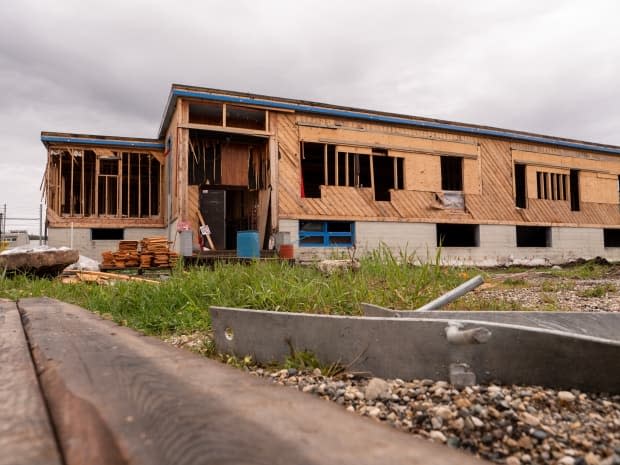 The Daylu Dena Council postponed plans to demolish a former residential school in Lower Post, B.C. (Vincent Bonnay/CBC - image credit)