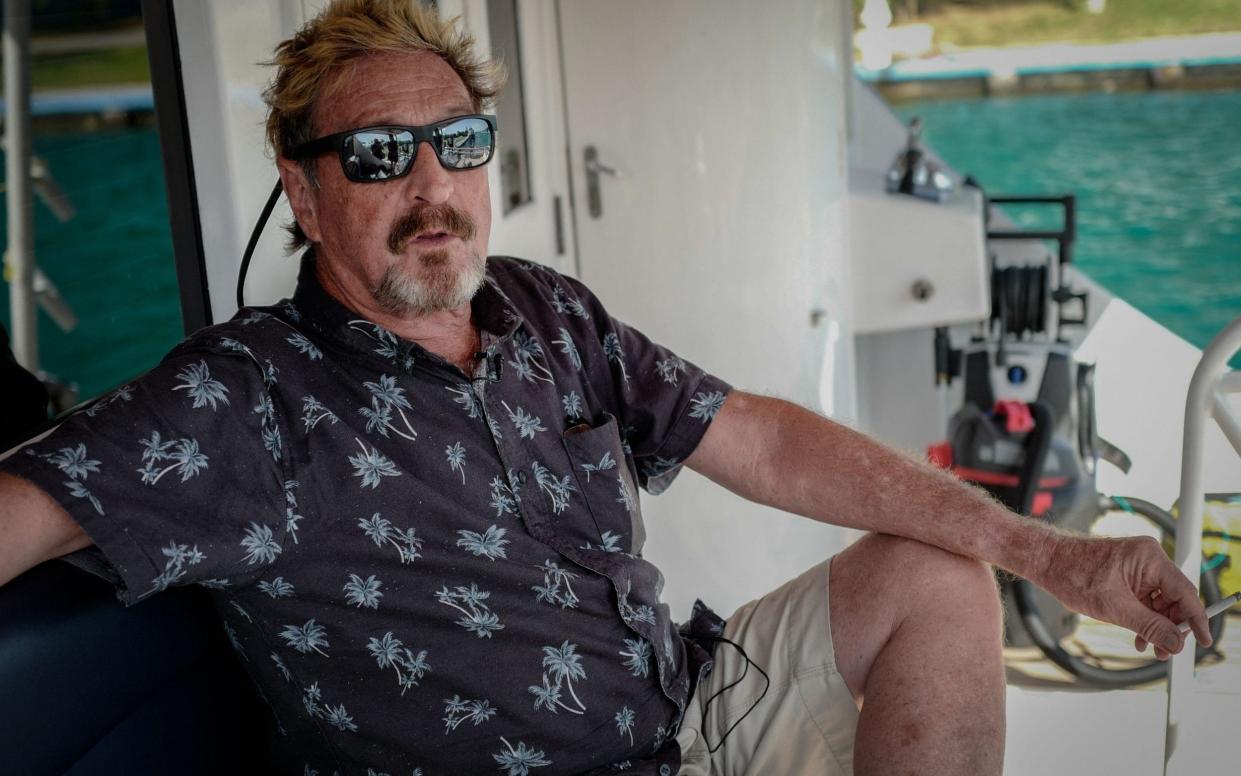 Millionaire John McAfee gesturing during an interview with AFP on his yacht anchored at the Marina Hemingway in Havana - AFP