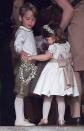 <p>The brother and sister patiently waited in their cute outfits for the service to begin. (Photo: PA) </p>