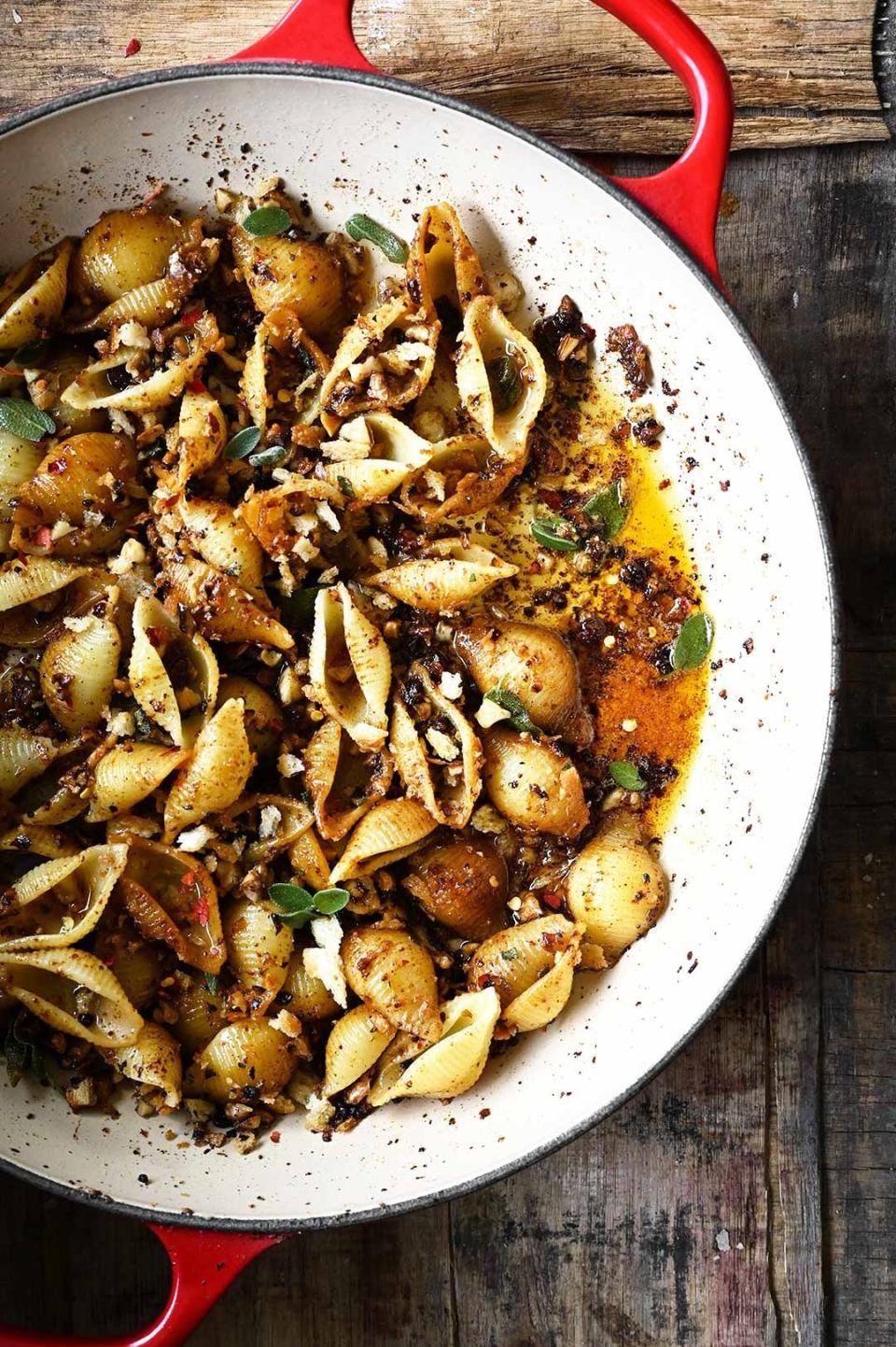 Brown butter pasta shells in a pan.