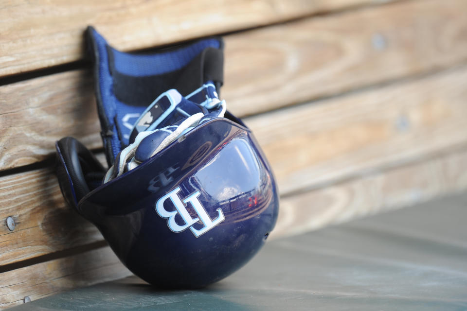 BALTIMORE, MD - JUNE 27:  Tampa Bay Rays helmet and pads in the dug out during a game one of a doubleheader against the Baltimore Orioles on June 27, 2014 at Oriole Park at Camden Yards in Baltimore, Maryland.  The Rays won 5-2.  (Photo by Mitchell Layton/Getty Images)