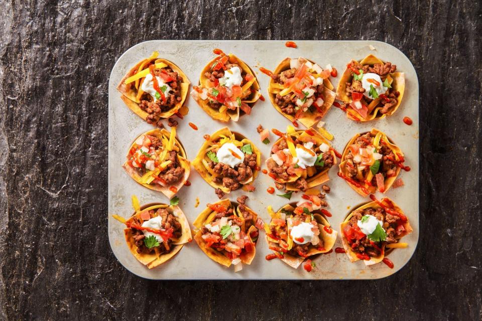 <p>Wonton wrappers stuffed with ground beef and cheese and then baked until crispy, bubbly perfection might be better than regular tacos.</p><p>Get the <a href="https://www.goodhousekeeping.com/food-recipes/a35191674/taco-cups-recipe/" rel="nofollow noopener" target="_blank" data-ylk="slk:Taco Cups recipe;elm:context_link;itc:0;sec:content-canvas" class="link "><strong>Taco Cups recipe</strong></a>.</p>