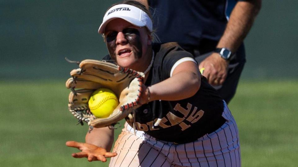 Capital infielder Keyten Erickson chases down a line drive in the 5A District Three softball championship game.