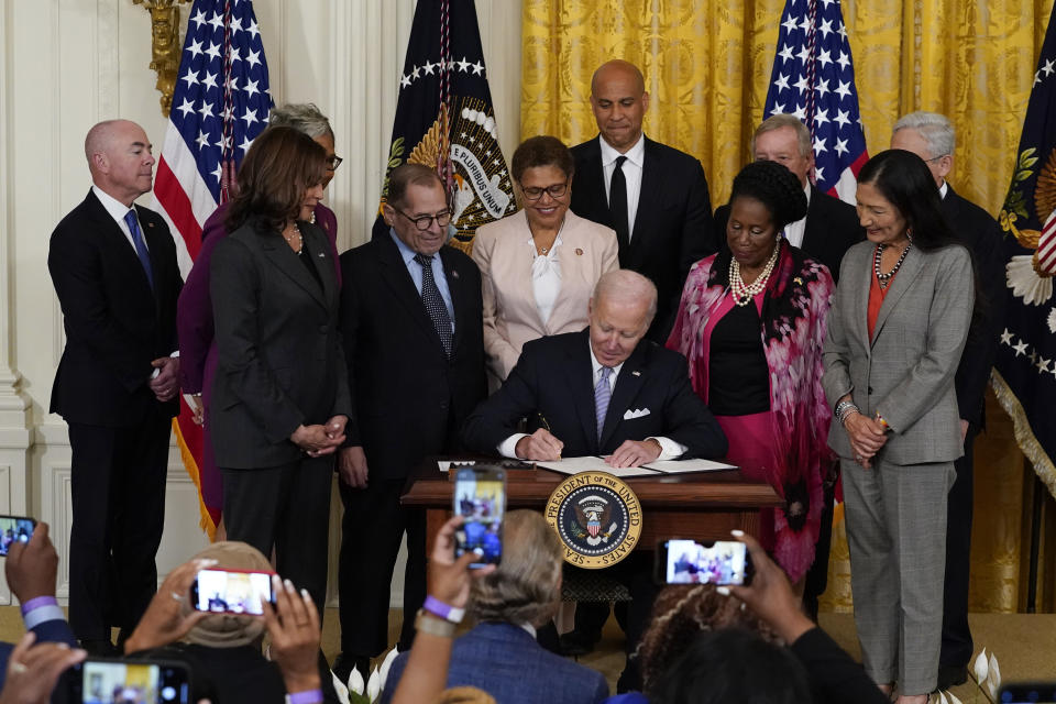 FILE - President Joe Biden signs an executive order in the East Room of the White House, May 25, 2022, in Washington. The order comes on the second anniversary of George Floyd's death, and is focused on policing. Biden is facing fresh pressure to make progress on police legislation after the killing of Tyre Nichols in Memphis (AP Photo/Alex Brandon, File)