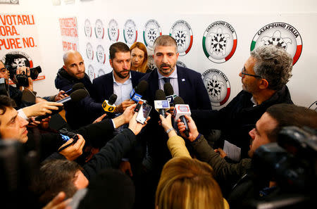 Vice president of the CasaPound party Simone Di Stefano talks with reporters during a news conference in their headquarters in Rome, Italy November 9, 2017. REUTERS/Tony Gentile