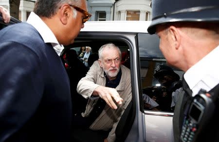 Britain's opposition Labour Party leader Jeremy Corbyn (C) leaves his home in London, Britain June 26, 2016. REUTERS/Peter Nicholls