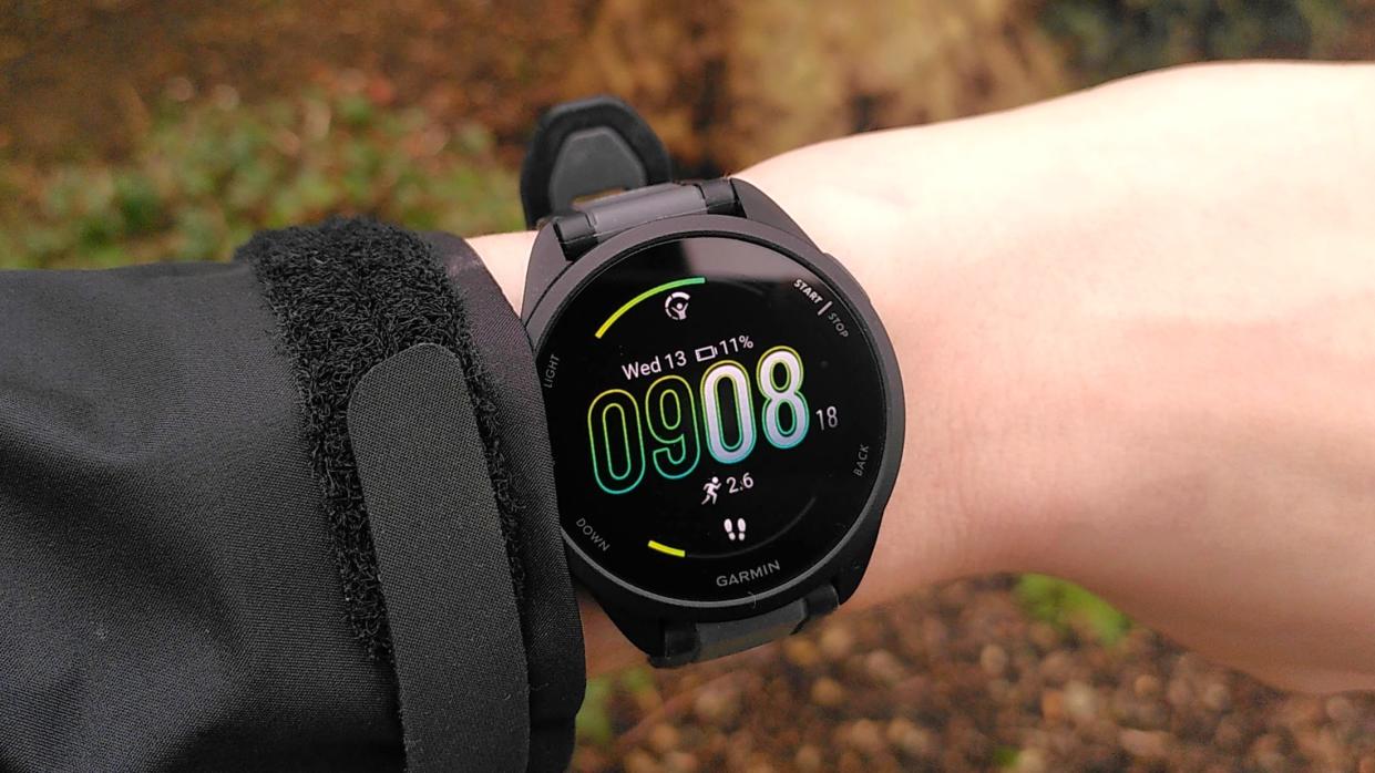  Garmin Forerunner 165 on woman's wrist. 