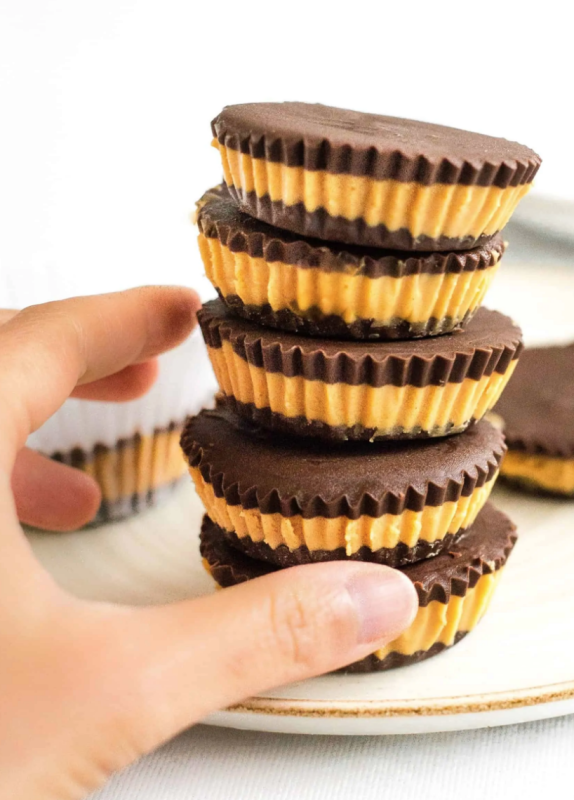 <p>Dish by Dish</p><p>These 4-ingredient homemade peanut butter cups come together so easily, and make the perfect sweet treat. Gluten-free and vegan.</p><p><strong>Get the recipe: <a href="https://www.dishbydish.net/homemade-peanut-butter-cups/" rel="nofollow noopener" target="_blank" data-ylk="slk:Homemade Peanut Butter Cups;elm:context_link;itc:0;sec:content-canvas" class="link rapid-noclick-resp">Homemade Peanut Butter Cups</a></strong></p>