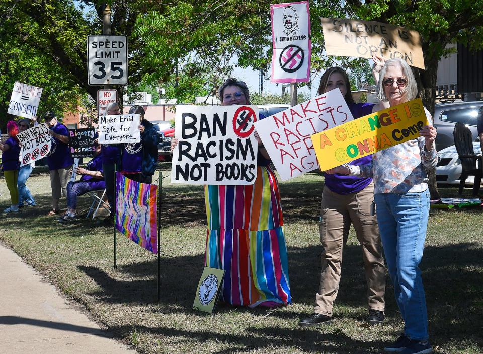 Members of the Enid Social Justice Committee protest the swearing-in of Judd Blevins to the Enid City Council.