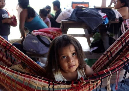 A girl is seen during a break of the 10th Indigenous March to defend Mother Earth near San Jose