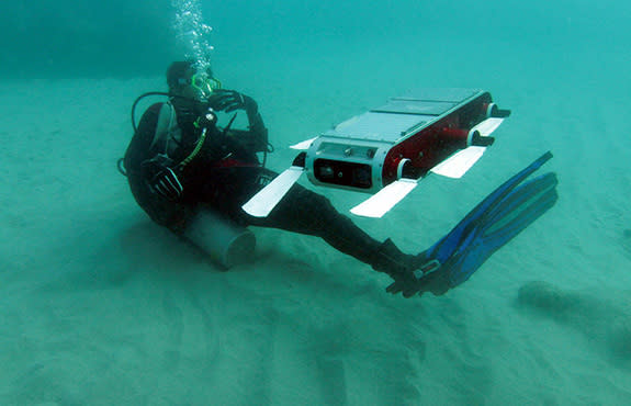 Yogesh Girdhar, then a McGill University doctoral student, working with underwater robot Aqua.