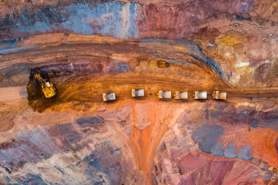 FTSE: Aerial view of open pit iron ore and heavy mining equipment. Photo: Getty.