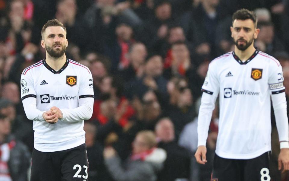Dejected Luke Shaw and Bruno Fernandes - Luke Shaw takes aim at 'complacent' Man Utd team-mates after Liverpool humiliation - Getty Images /Robbie Jay Barratt