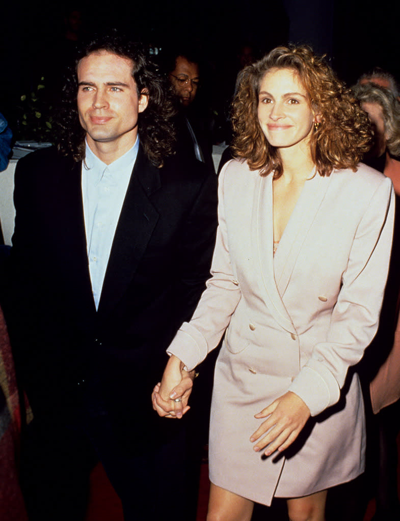 <p>After famously leaving Kiefer Sutherland just days before their planned nuptials, Roberts began briefly dating Jason Patric. They are seen here at the premiere of his film <i>Rush </i>on December 18, 1991. (Photo: Steve Granitz/WireImage)</p>