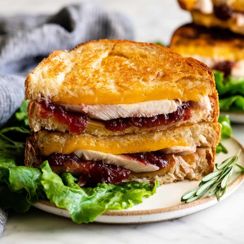 <p>Joy Food Sunshine</p><p>Turkey and cranberry sauce are nestled between two slices of buttery bread that have been grilled to perfection, all held together by melted cheddar cheese.</p><p><strong>Get the recipe: <a href="https://joyfoodsunshine.com/turkey-cranberry-sandwich/" rel="nofollow noopener" target="_blank" data-ylk="slk:Turkey Cranberry Sandwich;elm:context_link;itc:0;sec:content-canvas" class="link rapid-noclick-resp">Turkey Cranberry Sandwich</a></strong></p>