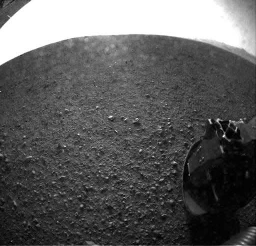 Image provided by the Jet Propulsion Laboratory shows one of the first images taken by NASA's Curiosity rover of the surface of Mars on August 6. The landing of the nuclear-powered Curiosity opened a new chapter in the history of interplanetary exploration by touching down on the Red Planet