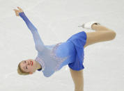 Gracie Gold of the United States competes in the women's team free skate figure skating competition at the Iceberg Skating Palace during the 2014 Winter Olympics, Sunday, Feb. 9, 2014, in Sochi, Russia. (AP Photo/Vadim Ghirda)