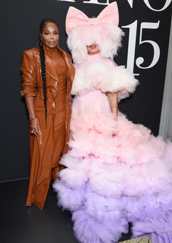 <p>Gilbert Flores/WWD via Getty</p> Janet Jackson and Sia