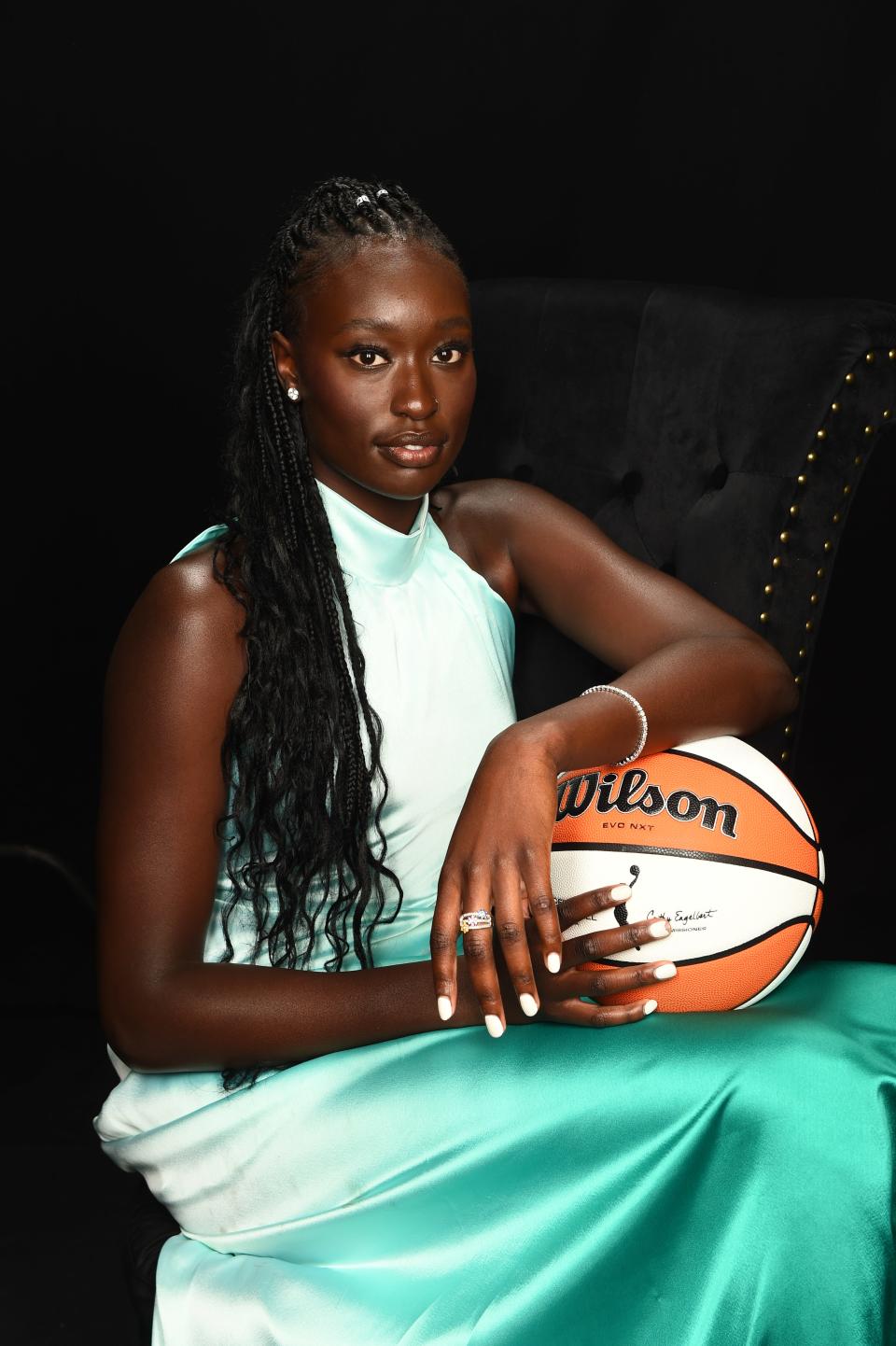 Nyadiew Puoch, the newest addition to the Atlanta Dream, wore braids and a milk bath manicure in her portrait.