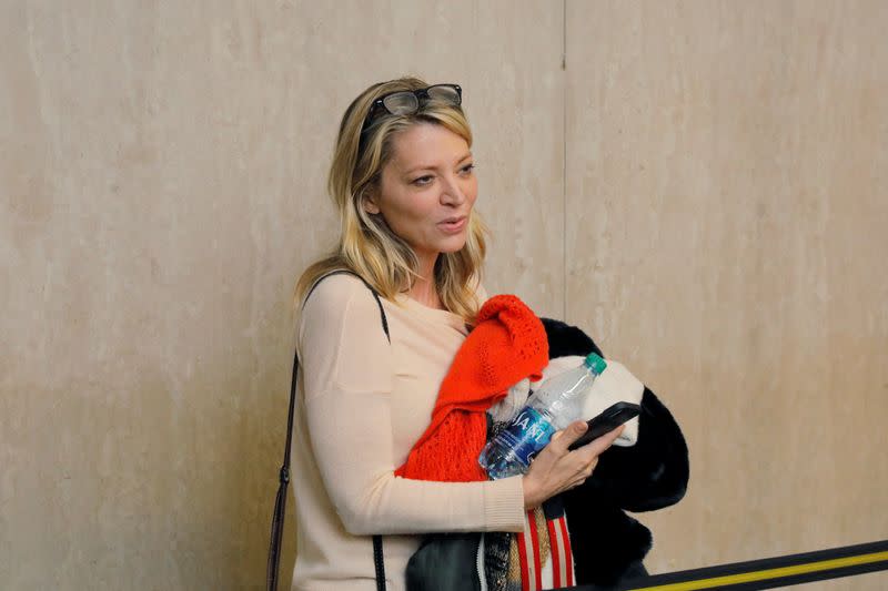 Katherine Kendall stands in the hallway after being in the courtroom for the trial of film producer Harvey Weinstein at New York Criminal Court in the Manhattan borough of New York City, New York