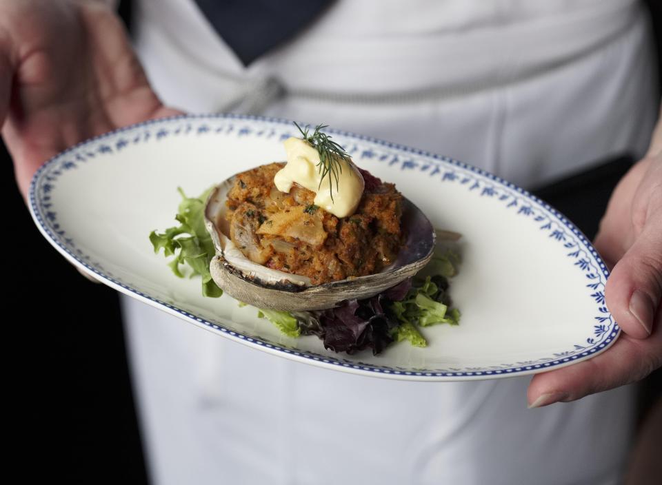 A quahog stuffie made with house-made chorizo and scallops from 22 Bowen’s is shown.