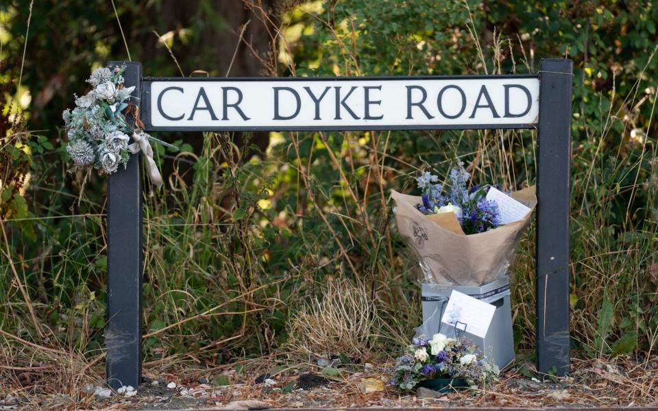 Flowers at the junction where five-month-old Louis Thorold died - Joe Giddens/PA Wire