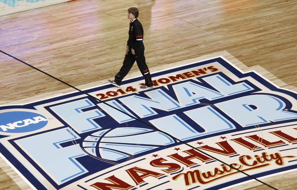 FILE - Stanford head coach Tara VanDerveer walks on the court during practice before the women's Final Four of the NCAA college basketball tournament, Saturday, April 5, 2014, in Nashville, Tenn. VanDerveer, the winningest basketball coach in NCAA history, announced her retirement Tuesday night, April 9, 2024, after 38 seasons leading the Stanford women’s team and 45 years overall. (AP Photo/John Bazemore, File)