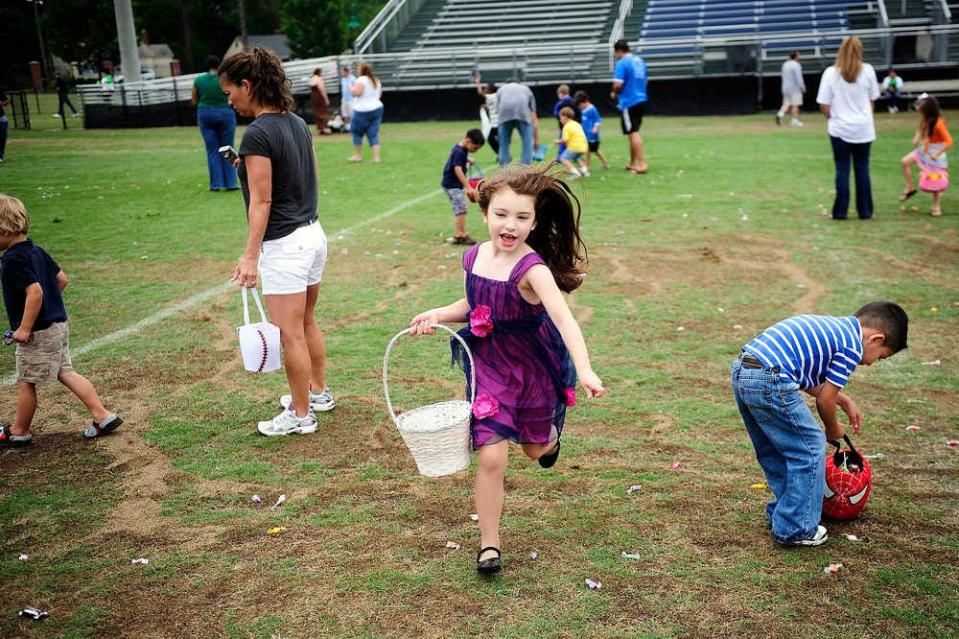 FILE - Dani Slusher, 6, hunts for easter eggs on Lions Field in North Augusta. Another such hunt will return to Lions Field on March 30.
