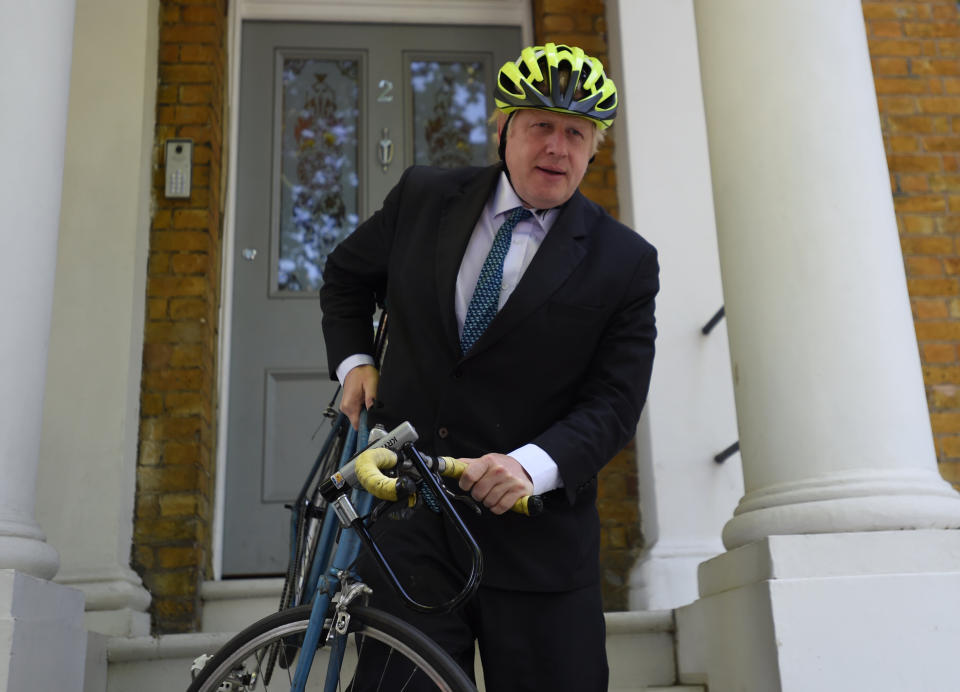 Boris Johnson leaves his home in London, ahead of the European Parliament elections.