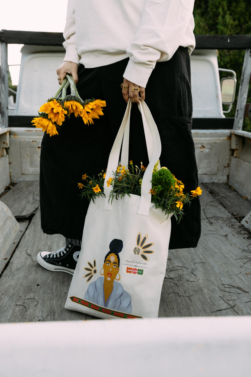 The small, limited-edition collection includes a T-shirt, sweatshirt, ring and tote bag (shown).