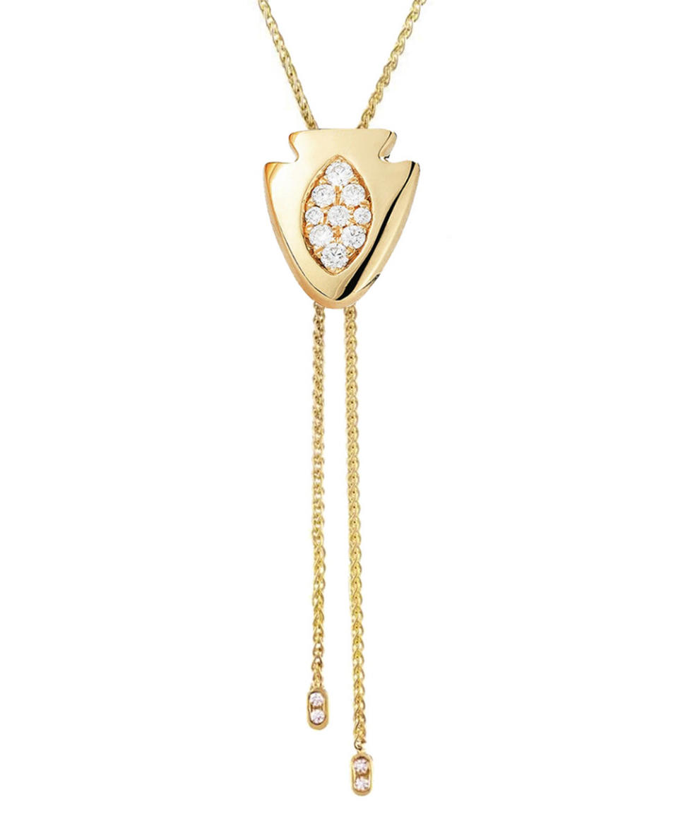 <p>$997 (originally $1,995) | <a rel="nofollow noopener" href="https://www.ylang23.com/product/arrowhead+bolo+tie+necklace.do" target="_blank" data-ylk="slk:SHOP IT;elm:context_link;itc:0;sec:content-canvas" class="link ">SHOP IT</a></p>