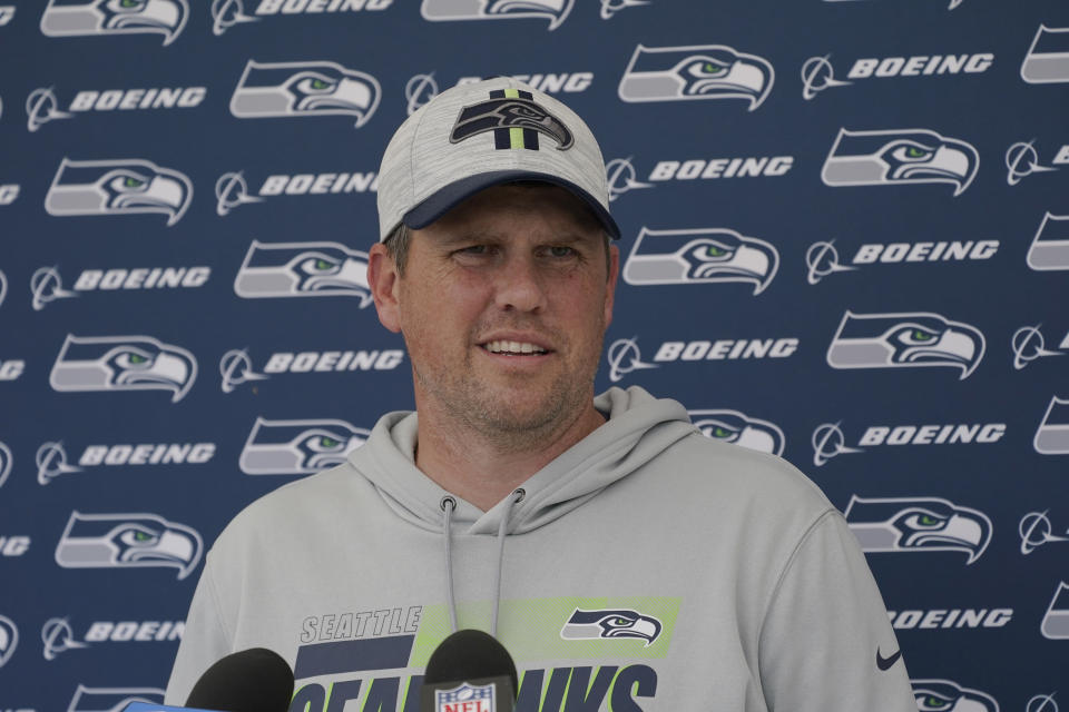 FILE - Seattle Seahawks offensive coordinator Shane Waldron talks to reporters after NFL football practice in Renton, Wash., in this Wednesday, Aug. 25, 2021, file photo. When the Seattle Seahawks brought Shane Waldron on board as offensive coordinator this offseason, they were hoping to pull some of what worked so well for the division rival Los Angeles Rams and implement it into a system run by Russell Wilson. The test of how well that's worked for Seattle comes on Thursday, Oct. 6, facing the Rams. (AP Photo/Ted S. Warren, File)