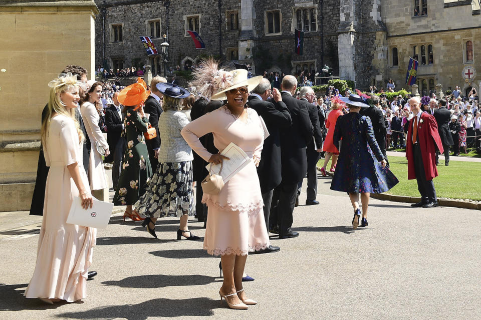 Oprah Winfrey leaves St George&#39;s Chapel at Windsor Castle after the wedding of Meghan Markle and Prince Harry,  in Windsor Castle in Windsor, near London, England, Saturday, May 19, 2018. (Ian West/pool photo via AP)