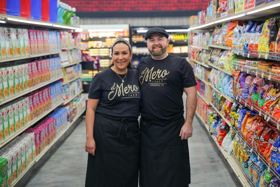 El Mero Taco owners Jacob Dries and Clarissa Dries pose in Flavortown during an episode of "Guy's Grocery Games."
