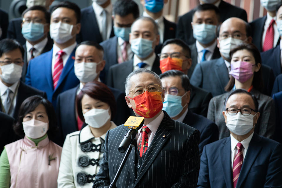 ADMIRALTY, HONG KONG - 2022/01/03: Tommy Cheung Yu-yan, wore a red China mask while delivering his speech after swearing in.
90 Lawmakers swore their oath to be the legislative council members after the election overhaul last year, with a landslide victory from pro-China parties, as only patriots are allowed. (Photo by Alex Chan Tsz Yuk/SOPA Images/LightRocket via Getty Images)