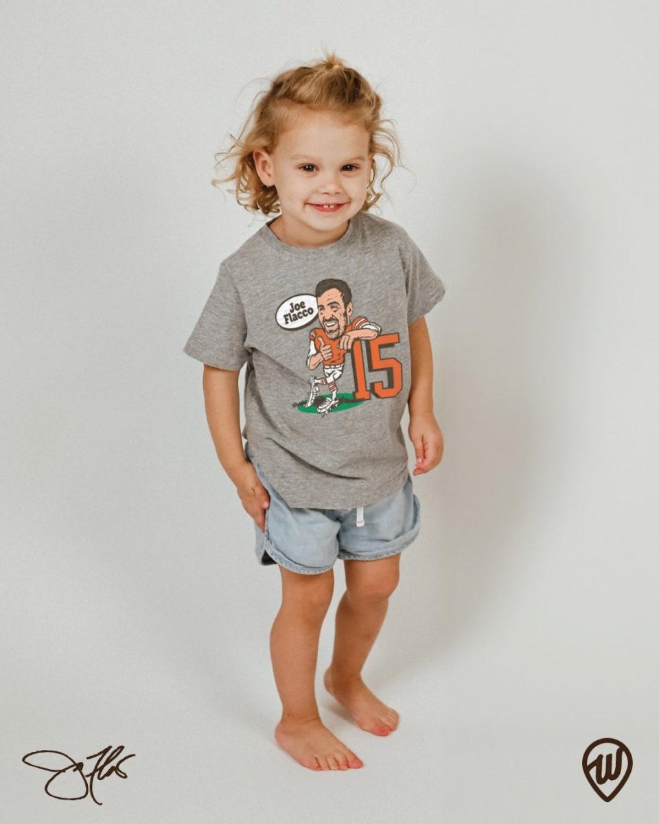 A youngster models a Joe Flacco shirt being sold by the Ohio-based clothing brand Where I'm From, which was co-founded by Canton natives Ryan Napier and Andrew VanderLind.