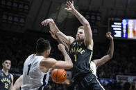 Purdue forward Caleb Furst (1) is stripped of the by Penn State guard Seth Lundy (1) during the second half of an NCAA college basketball game in West Lafayette, Ind., Wednesday, Feb. 1, 2023. Purdue defeated Penn State 80-60. (AP Photo/Michael Conroy)