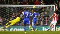 Oussama Assaidi (unseen) of Stoke City's shot beats Petr Cech of Chelsea during their English Premier League soccer match at the Britannia Stadium in Stoke-on-Trent, central England, December 7, 2013. REUTERS/Andrew Winning