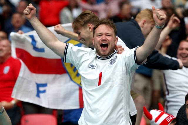 England fans celebrate the first goal