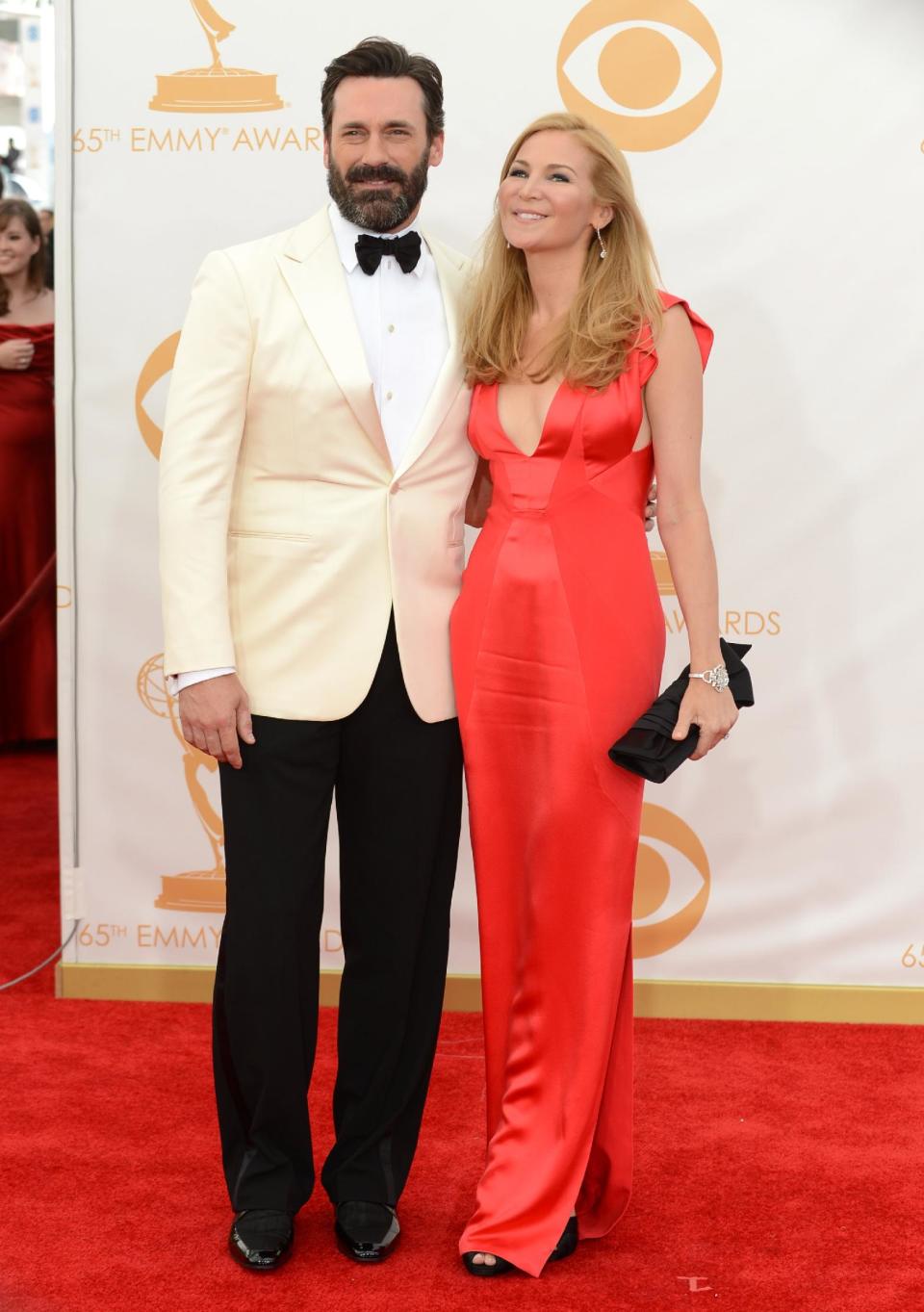 Jon Hamm, left, and Jennifer Westfeldt arrive at the 65th Primetime Emmy Awards at Nokia Theatre on Sunday Sept. 22, 2013, in Los Angeles. (Photo by Jordan Strauss/Invision/AP)